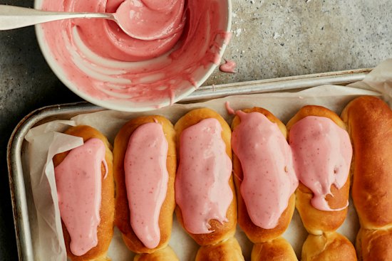 Asian-style milk bread provides a tender base for these strawberry iced finger buns.