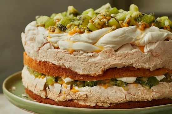 Layers of soft sponge and crisp meringue, topped with kiwi and passionfruit.
