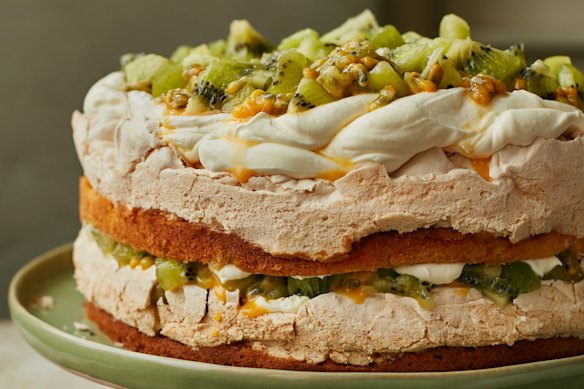 Layers of soft sponge and crisp meringue, topped with kiwi and passionfruit.