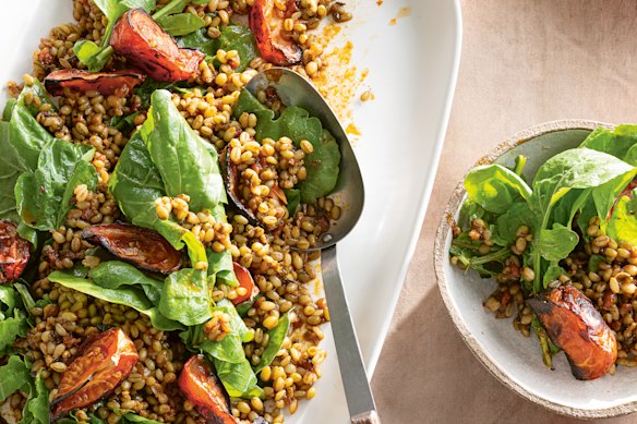 Freekeh, harissa, roasted tomato and rocket salad is delicious on its own or with steak.