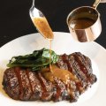 The grass-fed rib-eye with mustard jus.