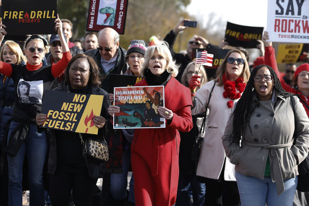 Demonstrating at a Fire Drill Fridays event in 2019. Fonda says the stand-out red coat will be the last new item of clothing she will buy.