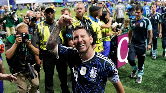 Messi waved to fans as he left the ground