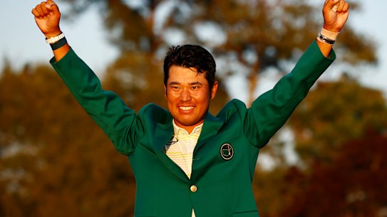AUGUSTA, GEORGIA - APRIL 11: Hideki Matsuyama of Japan celebrates during the Green Jacket Ceremony after winning the Masters at Augusta National Golf Club on April 11, 2021 in Augusta, Georgia. (Photo by Jared C. Tilton/Getty Images)