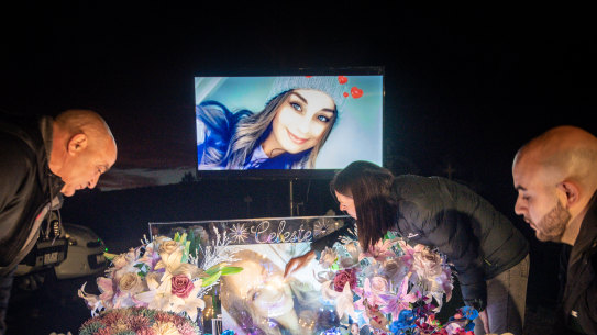 Family and friends gather at the grave of Celeste Manno for a vigil in late February.