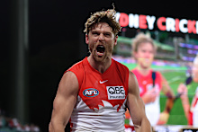 Dane Rampe roars as the Swans surge to their qualifying final win over the Brisbane Lions.