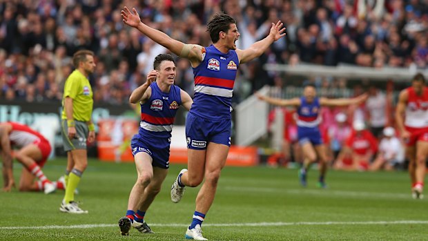 Tom Boyd celebrates the Western Bulldogs 2016 premiership.