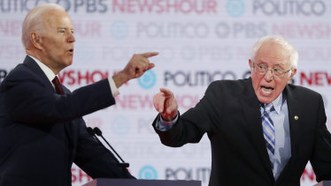Joe Biden and Bernie Sanders during a Democratic presidential primary debate last December.