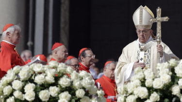 Pope Francis arrives to celebrate an Easter mass, in St Peter's square in Rome.