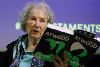 Canadian author Margaret Atwood holds a copy of her book “The Testaments” whose manuscript reportedly dodged the scam.