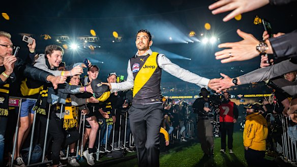 In the spotlight: New fan favourite Marlion Pickett celebrates after Richmond's flag win.