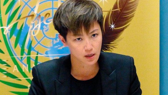 Hong Kong pop singer Denise Ho speaks out against China at the UN building in Geneva.
