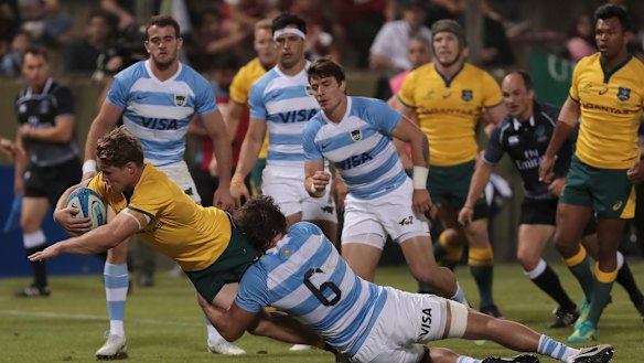 Turnaround: Wallabies captain Michael Hooper reaches for the try line.