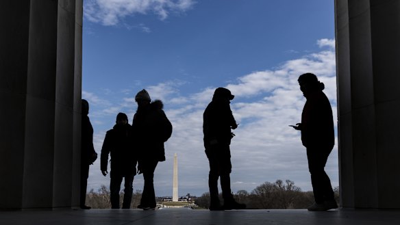 At a standstill: Visitors stand at the Lincoln Memorial.