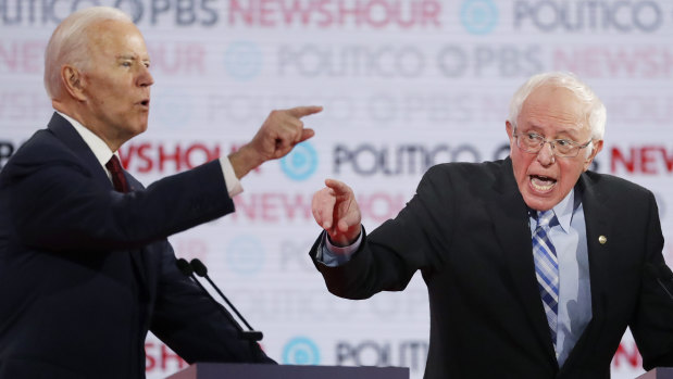 Joe Biden and Bernie Sanders during a Democratic presidential primary debate last December.