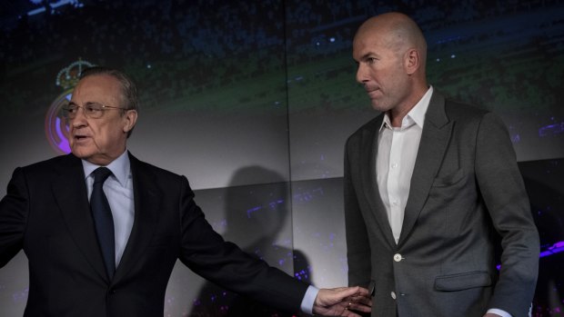 Zidane and club president Florentino Perez at the press conference on Tuesday.