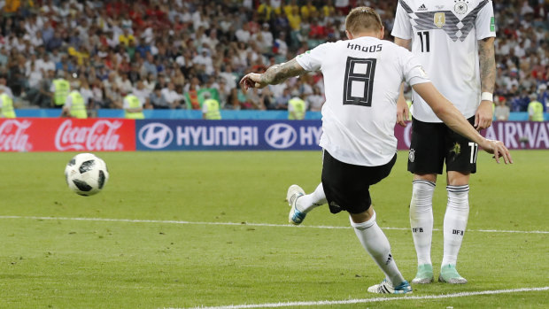 The moment: Toni Kroos scores the winner.