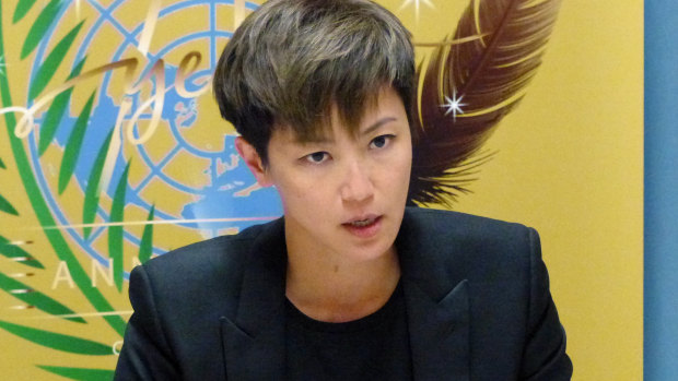 Hong Kong pop singer Denise Ho speaks out against China at the UN building in Geneva.