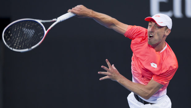 In the zone: Millman serves to his higher-ranked opponent during a 15-point winning run.