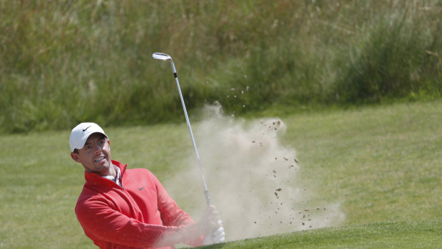 Northern Ireland’s Rory McIlroy plays out of a bunker on the 6th green.