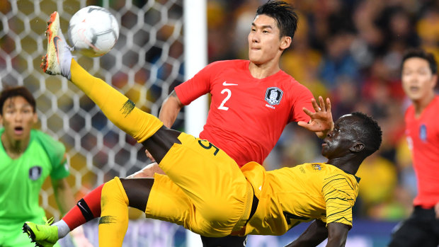 New blood: Awer Mabil executes a bicycle kick during a lively shift for the Socceroos against South Korea.