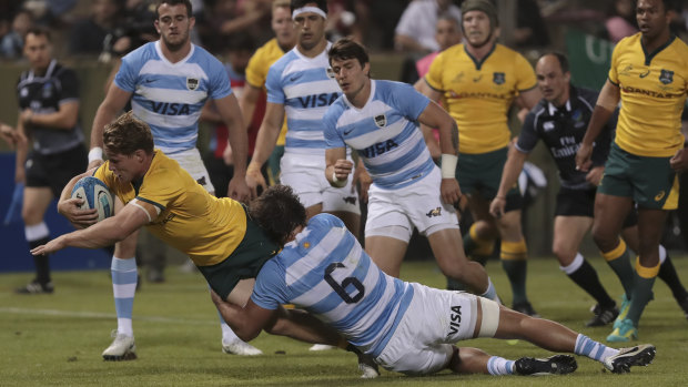 Turnaround: Wallabies captain Michael Hooper reaches for the try line.
