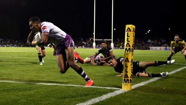 Josh Addo-Carr crosses for a Storm try in their humbling of the Panthers on Saturday. 