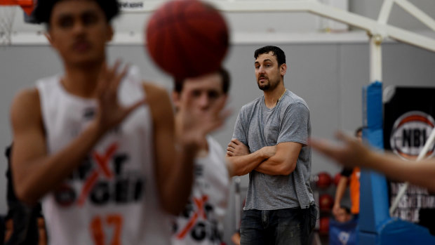 Bogut checks out the young talent at Tuesday's NBL Next Gen Camp in Melbourne.