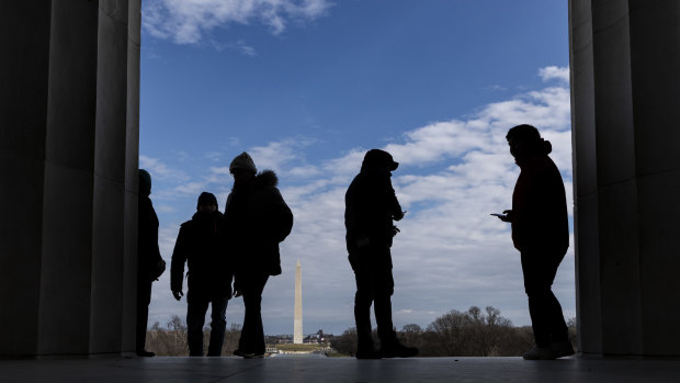 At a standstill: Visitors stand at the Lincoln Memorial.