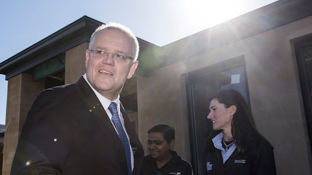 Prime Minister Scott Morrison visiting a first home buyer’s house nearing completion and some young adults who are saving to buy their first house in Morphettville in Adelaide.