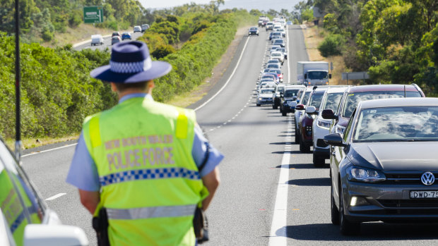 Traffic stretches along the Federal Highway near Sutton after a cyclist was killed after a crash with a truck.