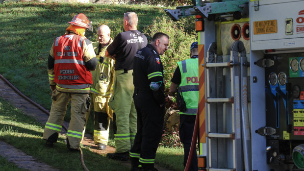 Emergency services respond to a fire that killed three people at the Everton Hills home.