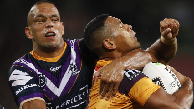 Will Chambers tackles Brisbane's Jamayne Isaako during the round one match last Thursday night.