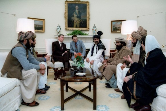 US president Ronald Reagan meets an Afghan delegation at the White House in 1983. While Reagan would later receive mujahideen leaders at the White House, only one of the Afghans seen here is a combatant - Mohammad Ghafoor Yousafzai, third from right. 