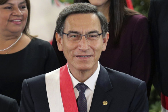 Peruvian President Martin Vizcarra smiles after the swearing-in ceremony of his new cabinet at the government palace in Lima last year.