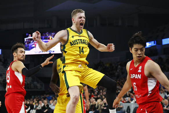 Jack White celebrated after this dunk over Japan at John Cain Arena this month - now he has even more reasons to celebrate after signing with the Nuggets.