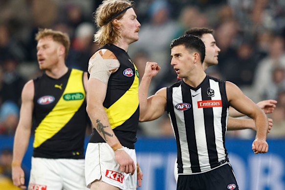 Nick Daicos of the Magpies celebrates a goal.
