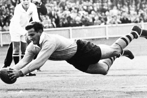 Jim Lenehan dives to score a try against South Africa at the Sydney Cricket Ground on June 19, 1965.