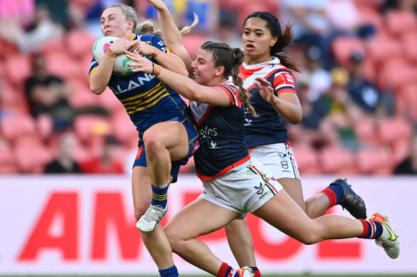 The Eels’ Tess Staines tries to crash through the Roosters defence.