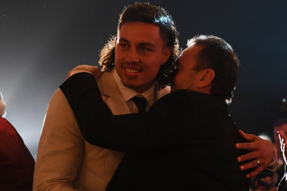 Joe Tapine and coach Ricky Stuart celebrate his Mal Meninga medal win as Canberra’s best player in 2022.