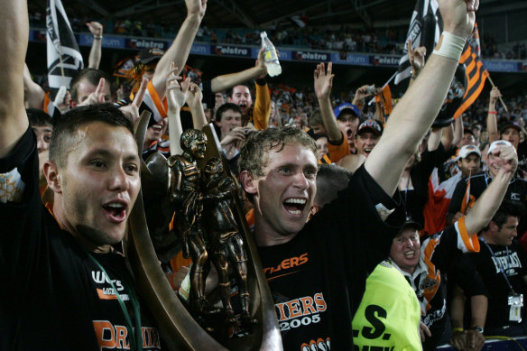 The best of times: Scott Prince and Brett Hodgson after the 2005 grand final.
