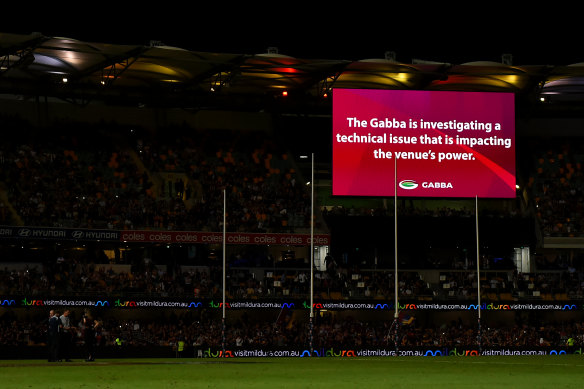 A power outage halted play at the Gabba.