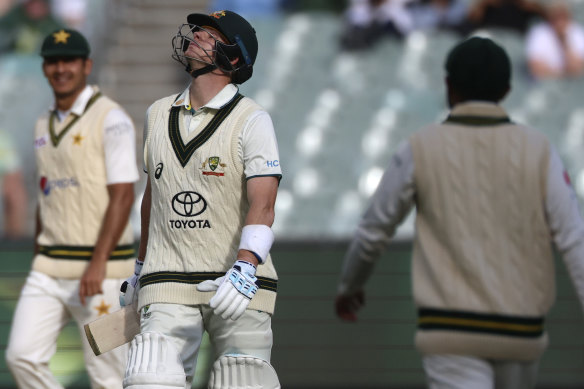 Late twist: A frustrated Steve Smith after he was gone for 50.