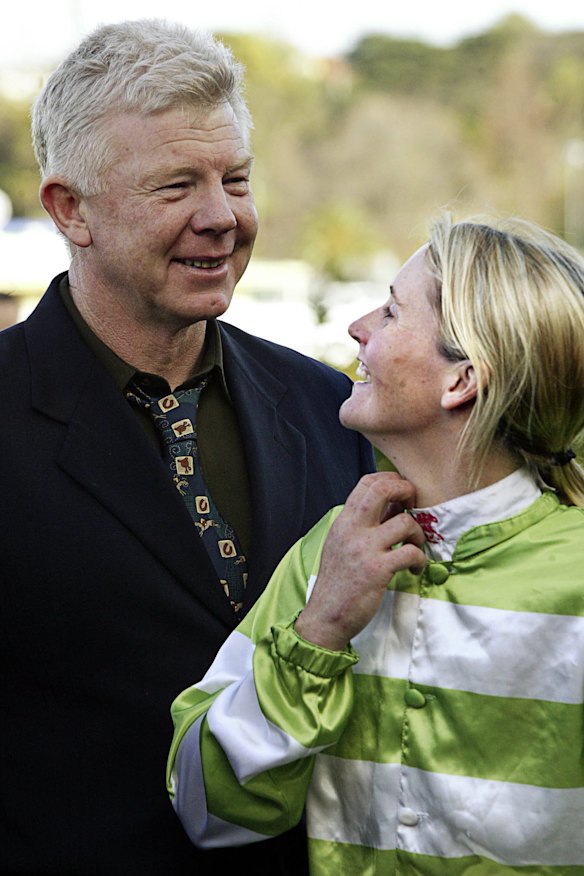 Andrea Leek (pictured here with John) after she made history in 2004 as the first woman to win the Grand National Hurdle at Flemington.