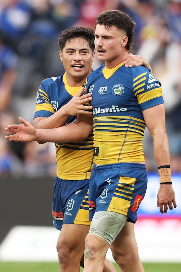 Ronald Volkman and Jonah Pezet celebrate the Eels’ win on Sunday.