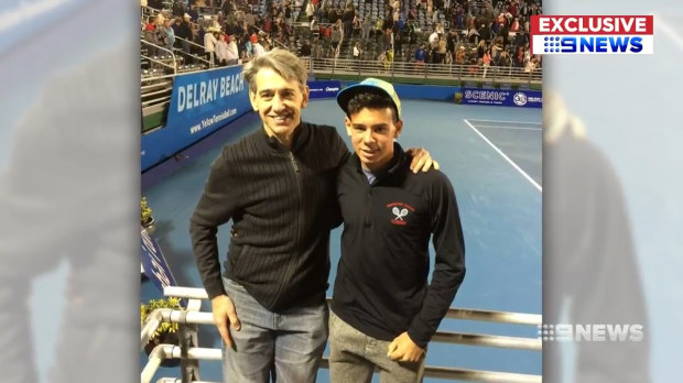 Tennis fans Edmund Pribitkin and his teenage son Edik.