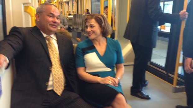Gold Coast Mayor Tom Tate and Queensland Deputy Premier Jackie Trad take a ride on light rail.