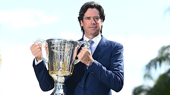 Gillon McLachlan with the premiership trophy.