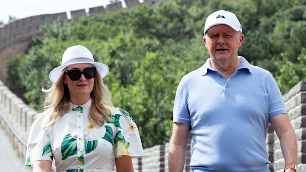 Jodie Haydon in a dress from Australian label Leo Lin and her fiancée Prime Minister Anthony Albanese on the Great Wall of China.