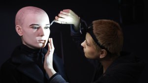 Artistic coordinator Mel Creek applies the finishing touches on a wax figure of the late singer Sinead O’Connor at the National Wax Museum Plus in Dublin.